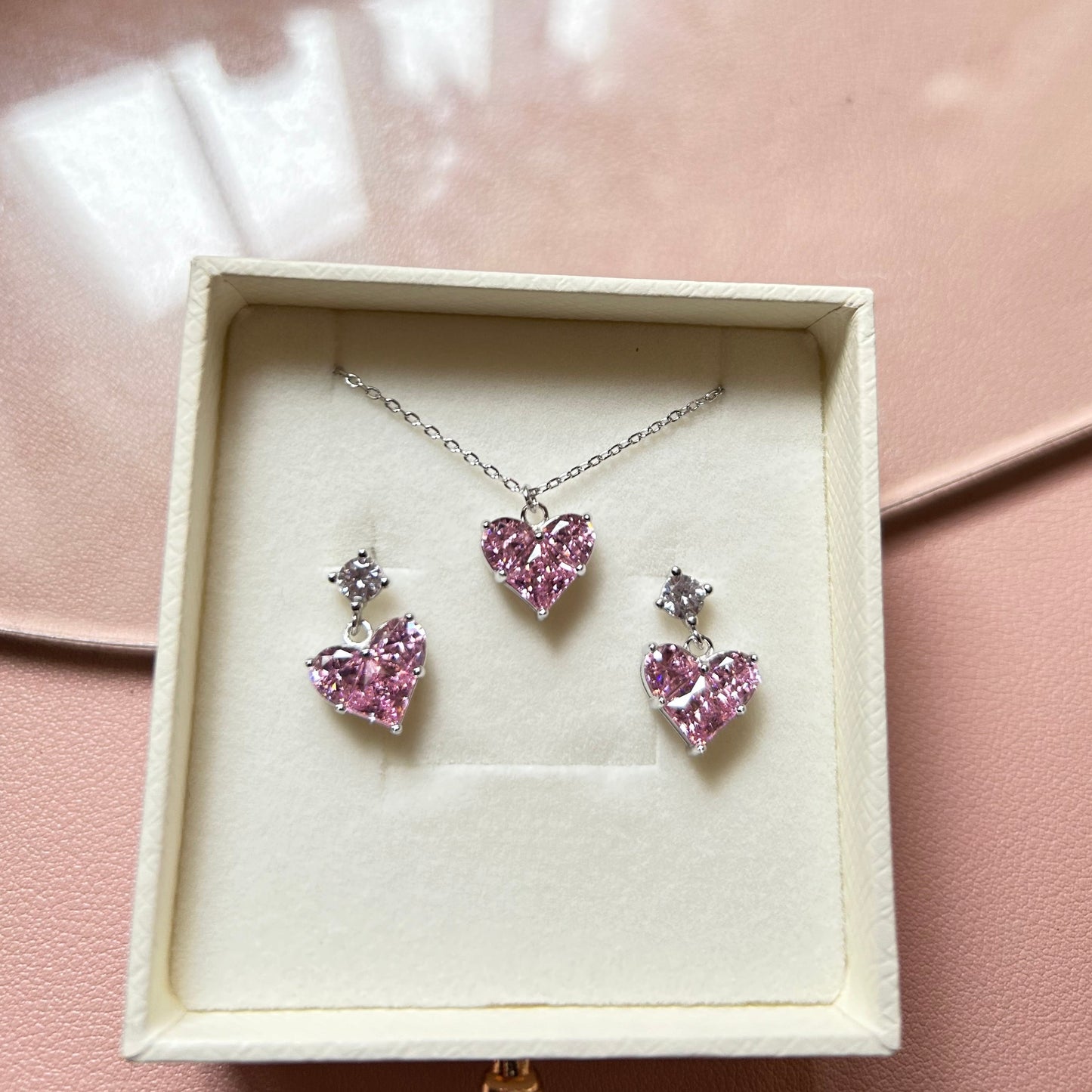 KARA (P) - Heart Shaped Zirconia Dangled Earring Studs